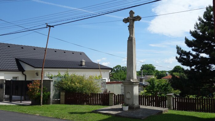 Stone cross in front of the church - Brestovany-1