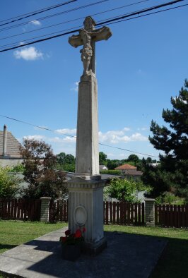 Stone cross in front of the church - Brestovany-2